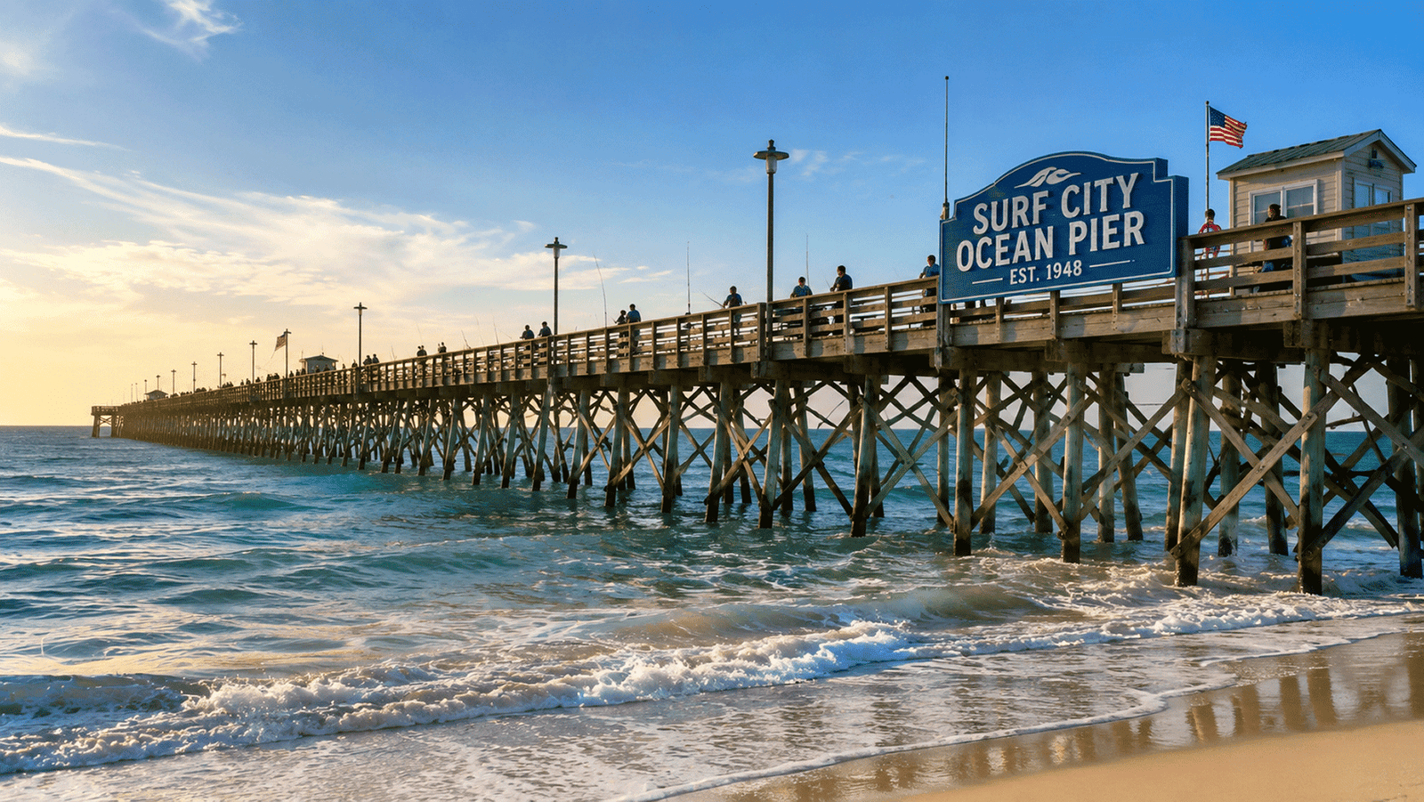 Angler rigging a bottom fishing setup on Surf City Ocean Pier in Topsail Island NC